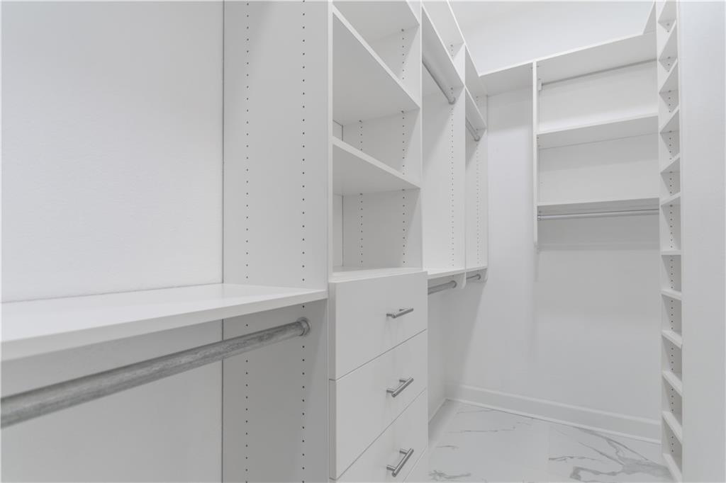 3445 Stratford Road Northeast, Unit 2107 Atlanta, GA 30326 - Photo 10 of 22 a view of walk in closet