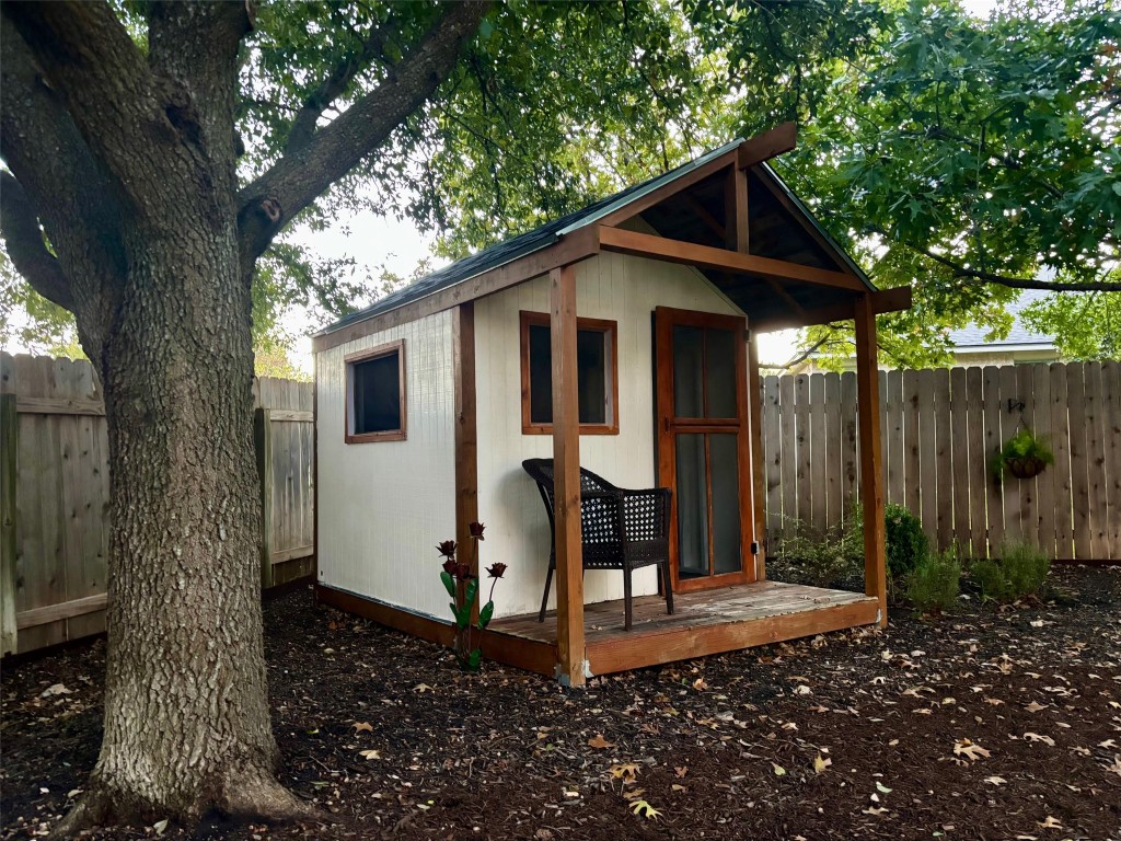 3231 Foothills Trail Round Rock, TX 78681 - Photo 20 of 25 This Cute shed has many possibilities! Potting shed, play house or fort! Covered deck on front.