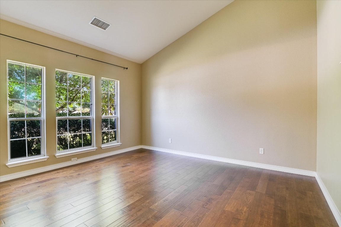 3231 Foothills Trail Round Rock, TX 78681 - Photo 4 of 25 Perfect place to relax! High vaulted ceiling, 3 large front windows, provides natural light. Room is approximately 10 x 11 Ft