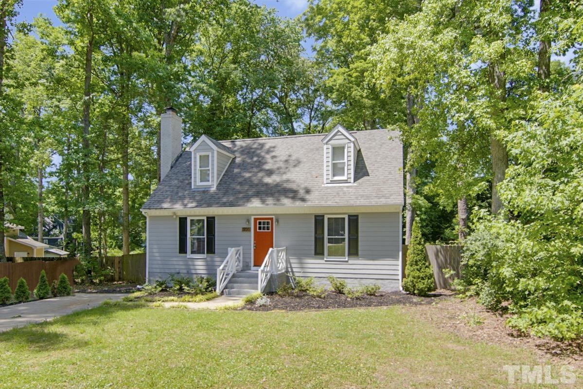 500 Chapwith Road Garner, NC 27529 - Photo 2 of 28 a front view of a house with a yard and garage