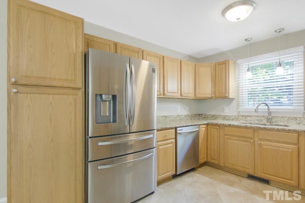 500 Chapwith Road Garner, NC 27529 - Photo 8 of 28 a kitchen with appliances a sink and a window