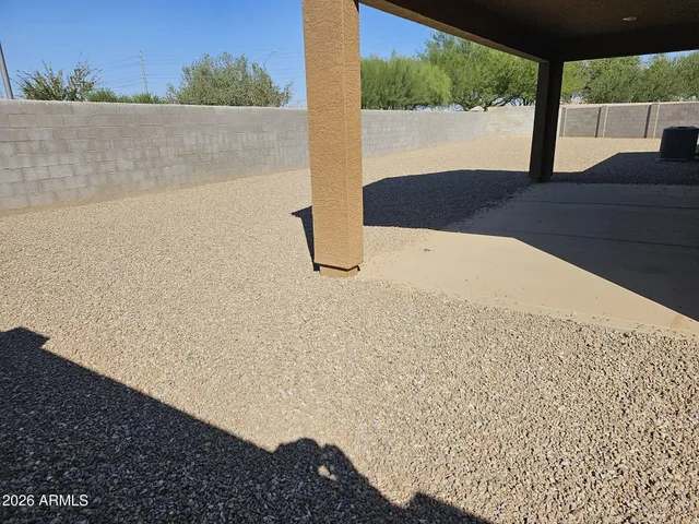 a view of a floor to ceiling window and an outdoor view
