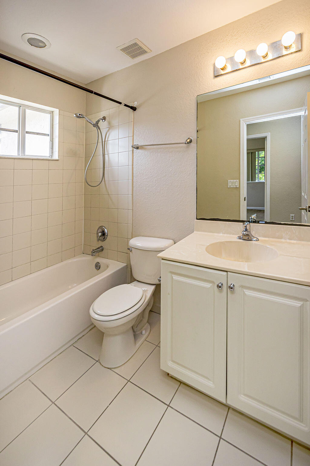 970 Tortuga Drive Riviera Beach, FL 33404 - Photo 20 of 37 a bathroom with a sink toilet and shower