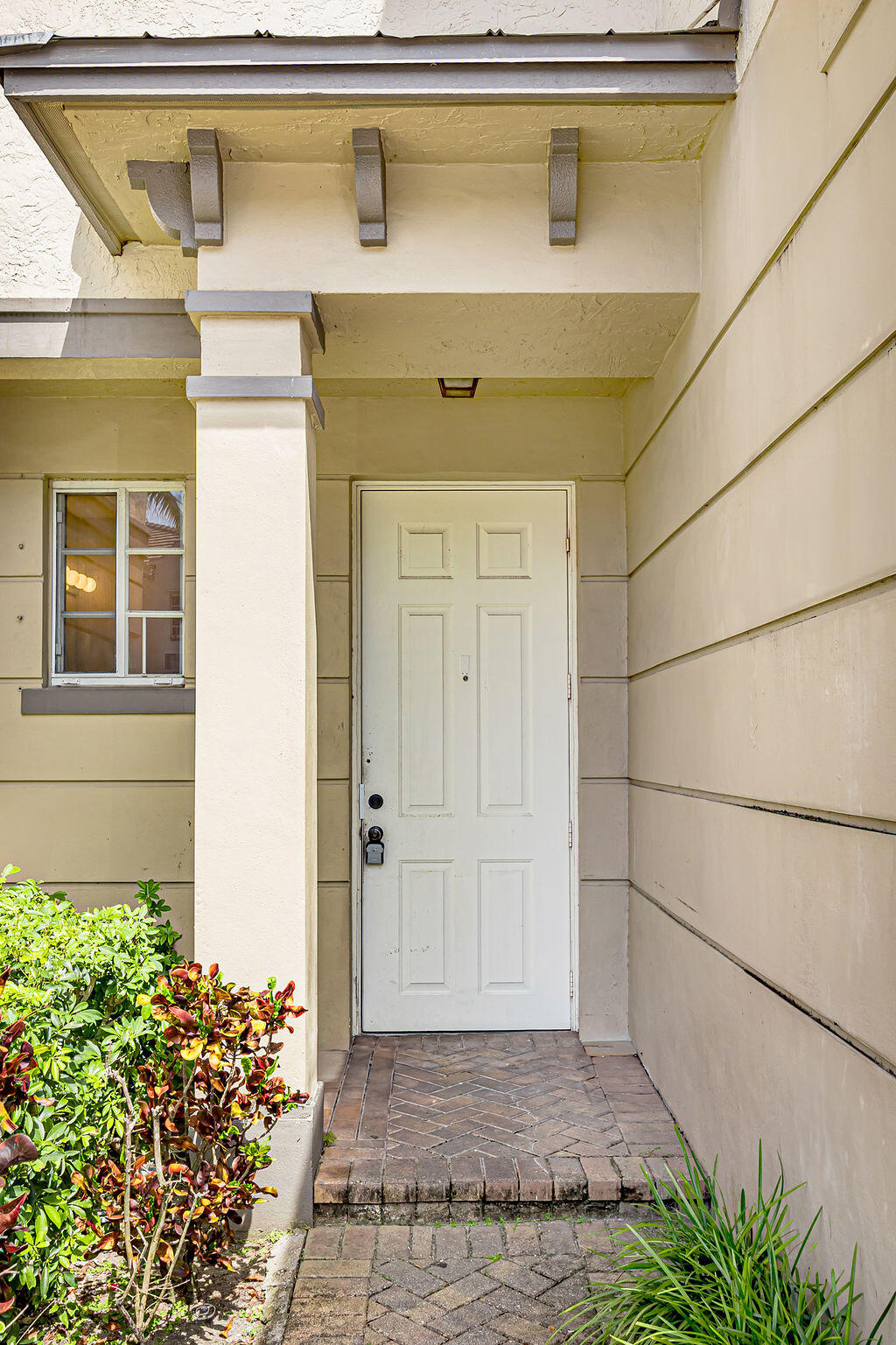 970 Tortuga Drive Riviera Beach, FL 33404 - Photo 2 of 37 a view of a garage door