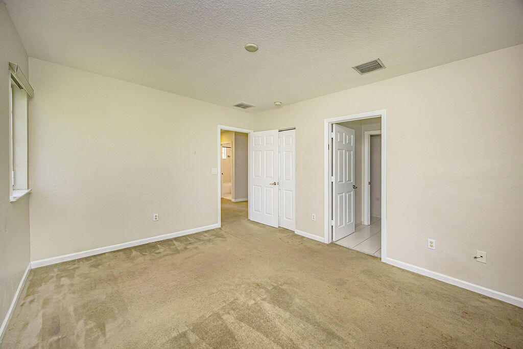 970 Tortuga Drive Riviera Beach, FL 33404 - Photo 23 of 37 a view of an empty room
