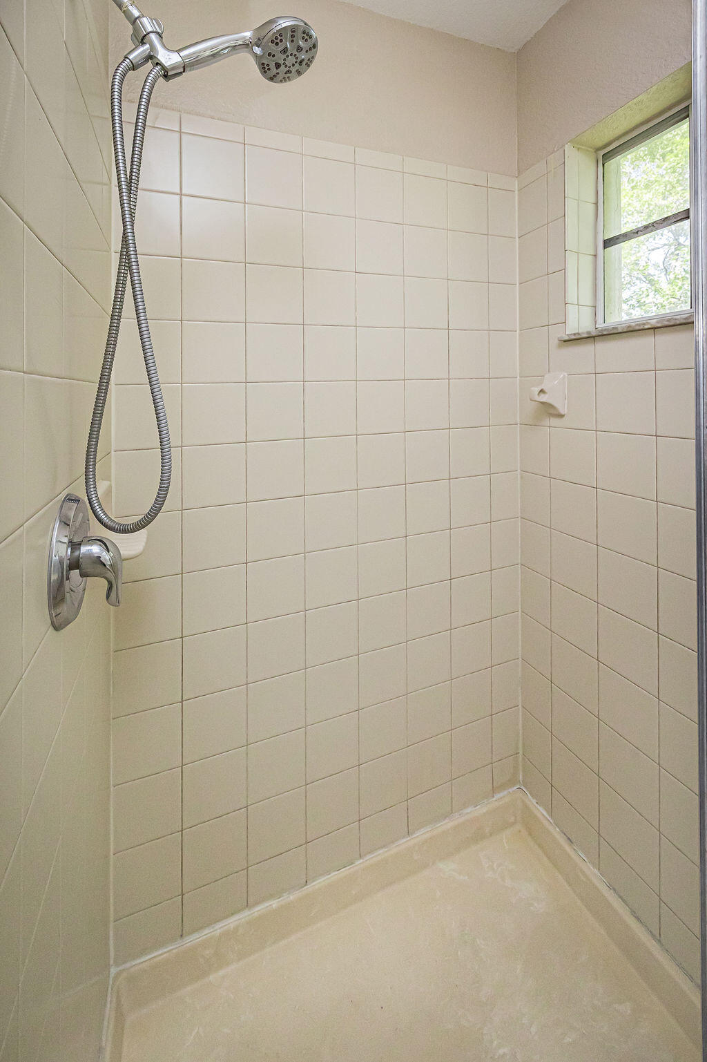 970 Tortuga Drive Riviera Beach, FL 33404 - Photo 26 of 37 a bathroom with a shower