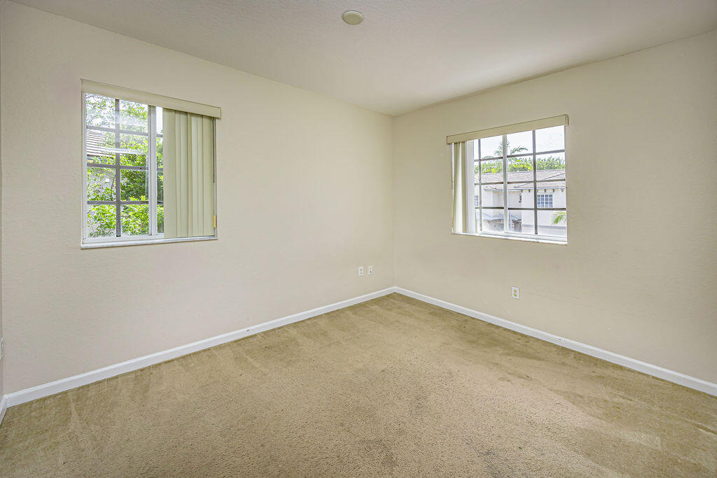 970 Tortuga Drive Riviera Beach, FL 33404 - Photo 29 of 37 an empty room with windows