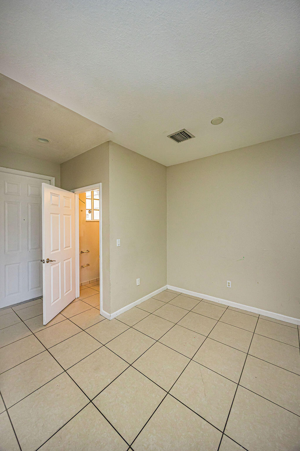 970 Tortuga Drive Riviera Beach, FL 33404 - Photo 9 of 37 a view of a room with white walls