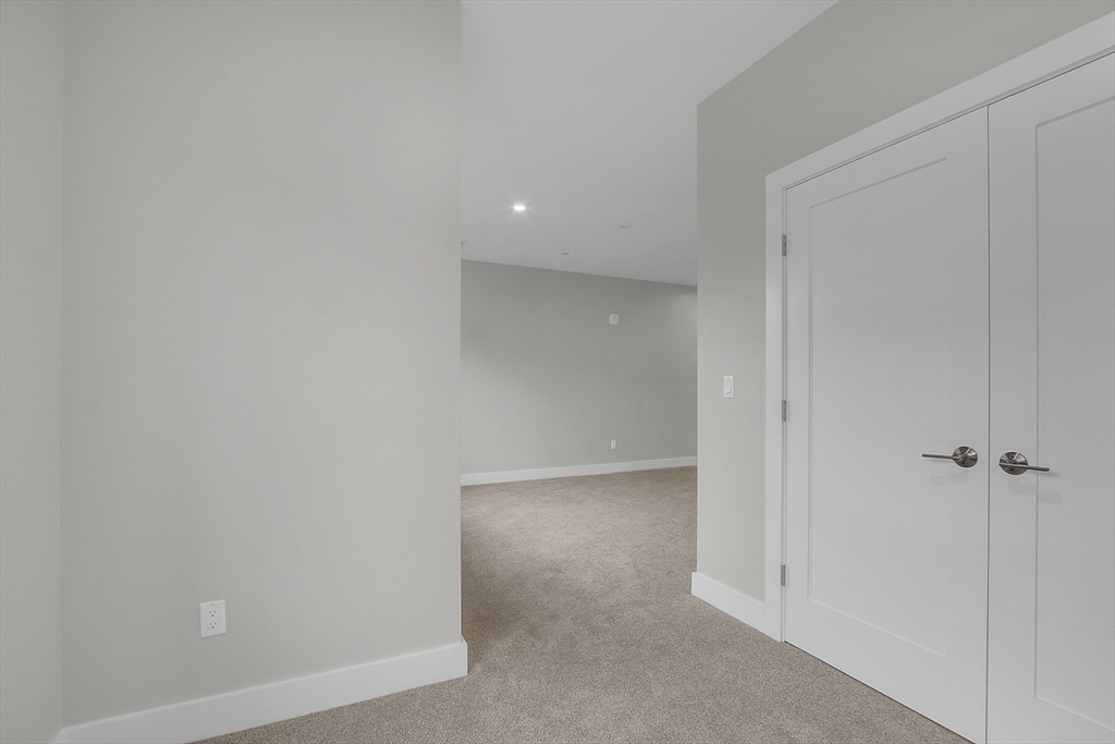 55 Pointe Place, Unit 304 Dover, NH 03820 - Photo 25 of 42 an empty room with a shower