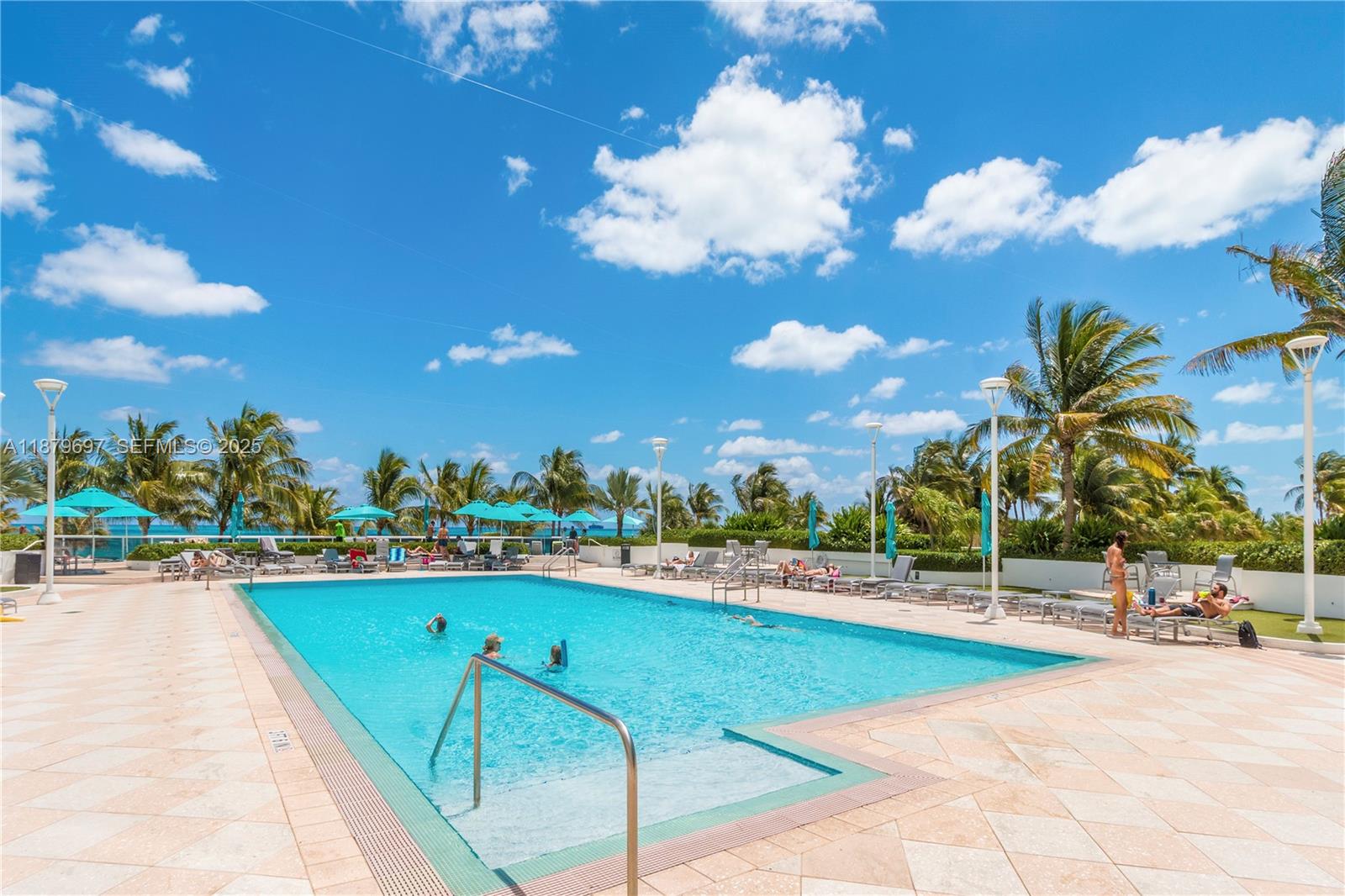 100 Lincoln Road, Unit 1523/1525 Miami Beach, FL 33139 - Photo 19 of 25 a view of swimming pool with outdoor seating