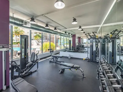 a view of a room with gym equipment