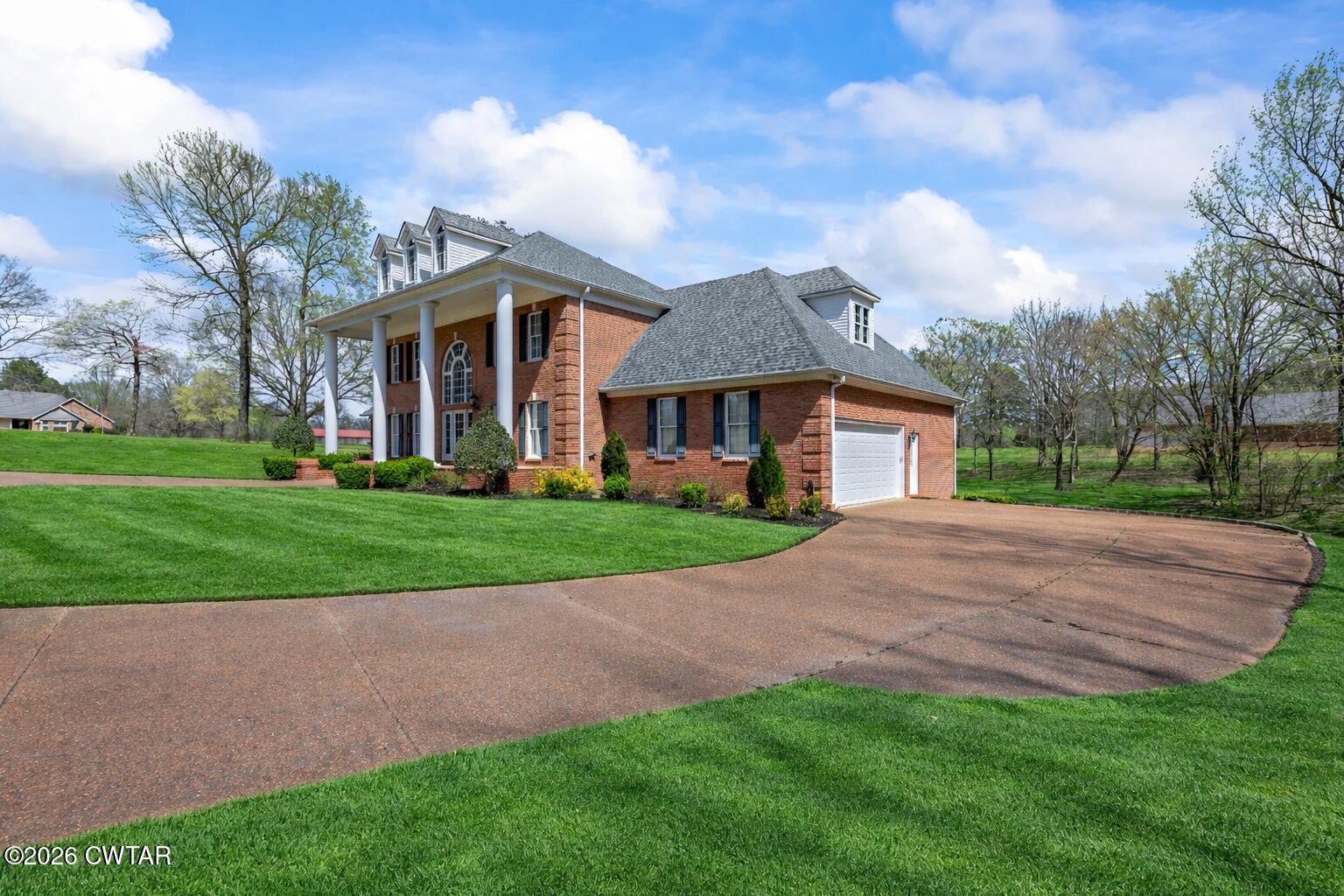 25 Oak Ridge Drive Henderson, TN 38340 - Photo 2 of 49 side