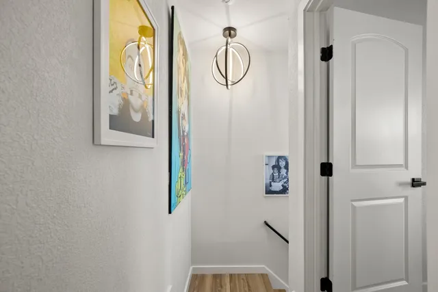 a bathroom with a walk in closet and a window