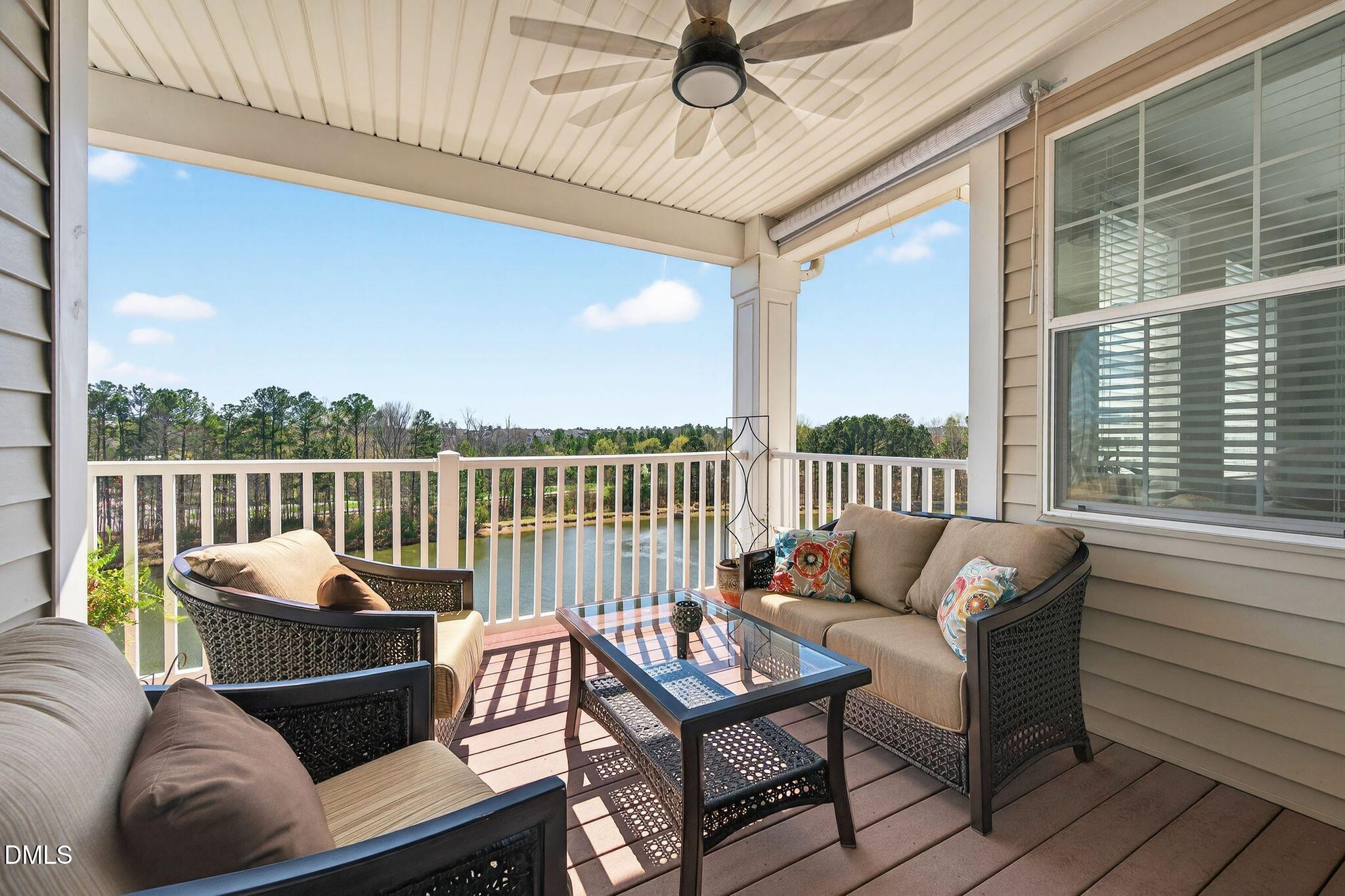 10511 Rosegate Court, Unit 305 Raleigh, NC 27617 - Photo 2 of 48 a roof deck with couches and wooden floor