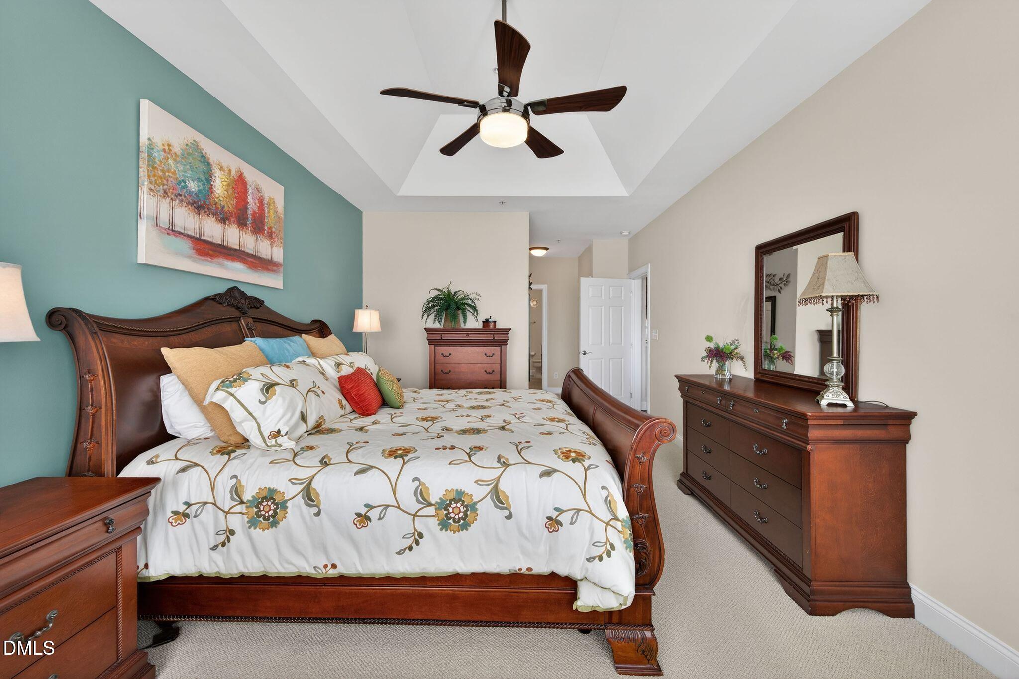 10511 Rosegate Court, Unit 305 Raleigh, NC 27617 - Photo 30 of 48 a bedroom with bed and window