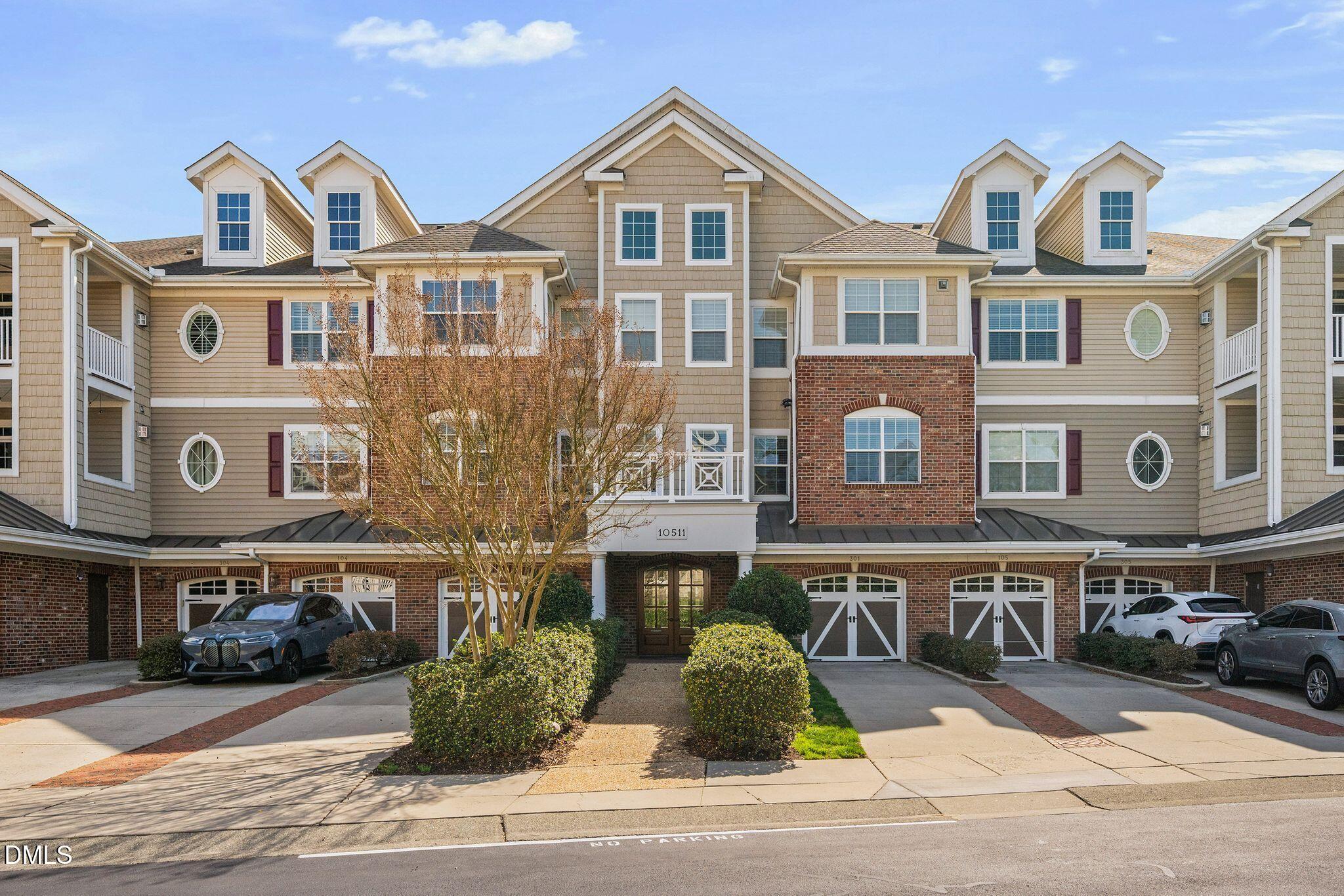 10511 Rosegate Court, Unit 305 Raleigh, NC 27617 - Photo 4 of 48 a front view of residential building
