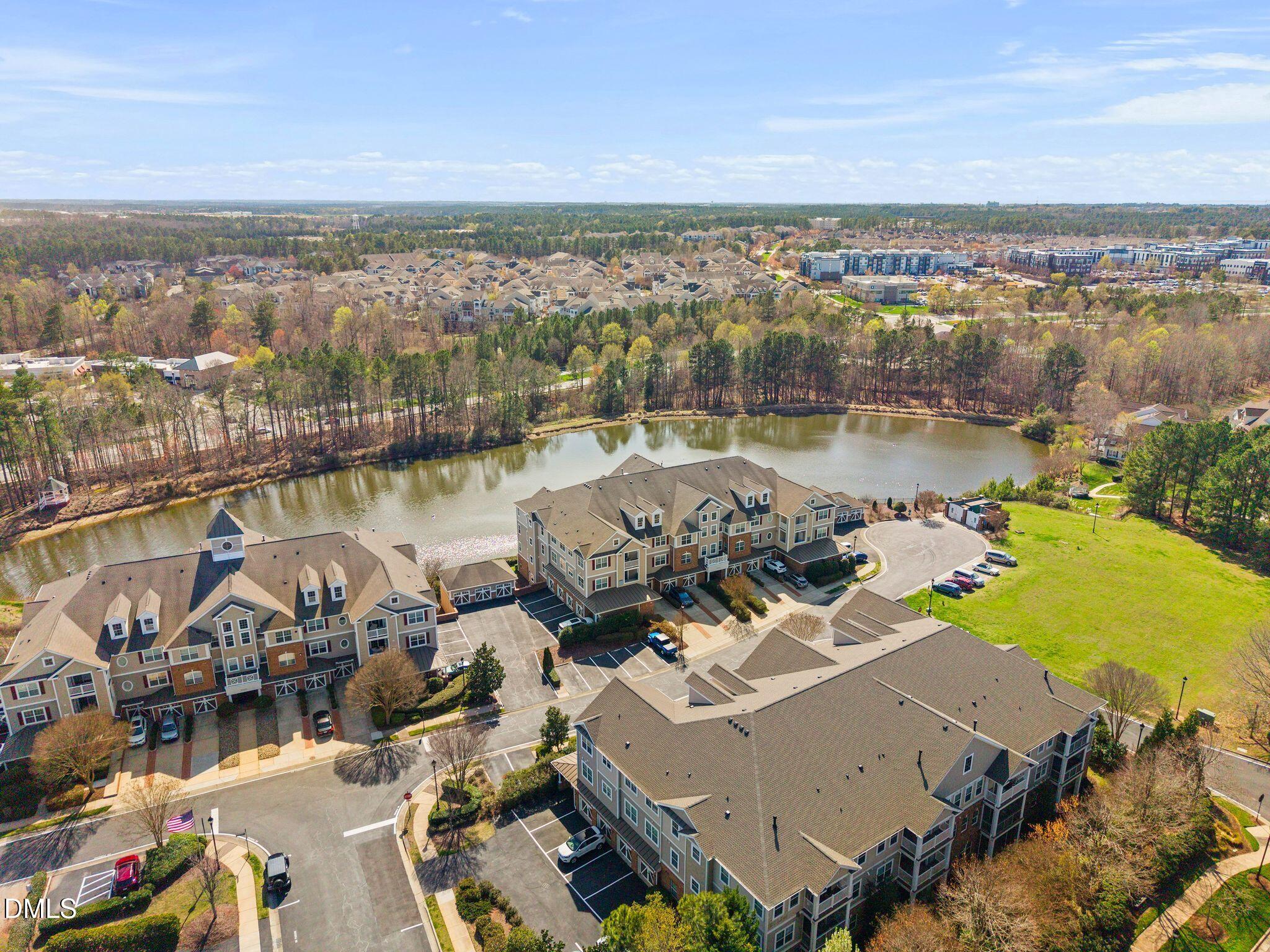 10511 Rosegate Court, Unit 305 Raleigh, NC 27617 - Photo 41 of 48 an aerial view of a house with lake view