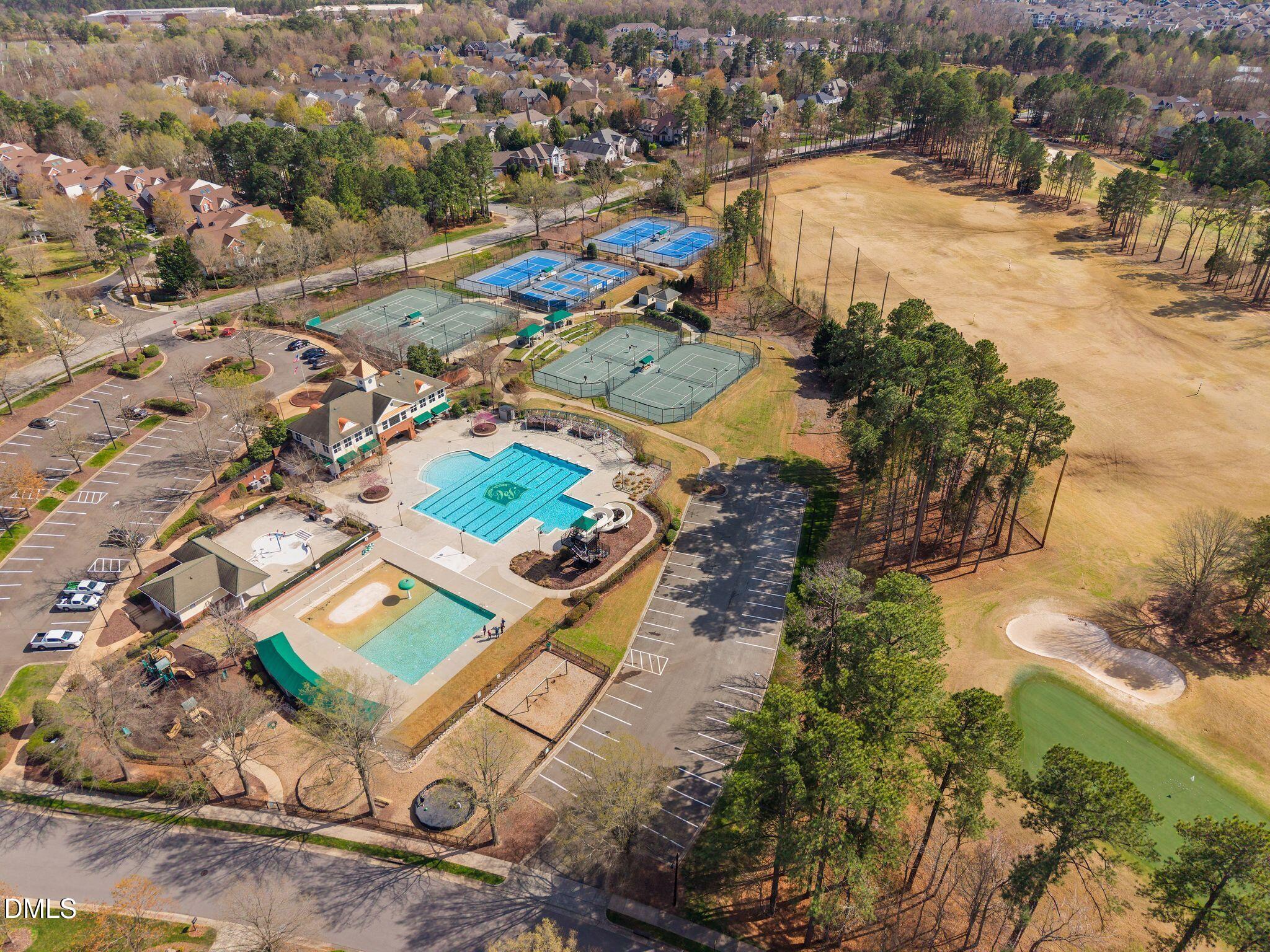 10511 Rosegate Court, Unit 305 Raleigh, NC 27617 - Photo 45 of 48 an aerial view of residential houses with outdoor space