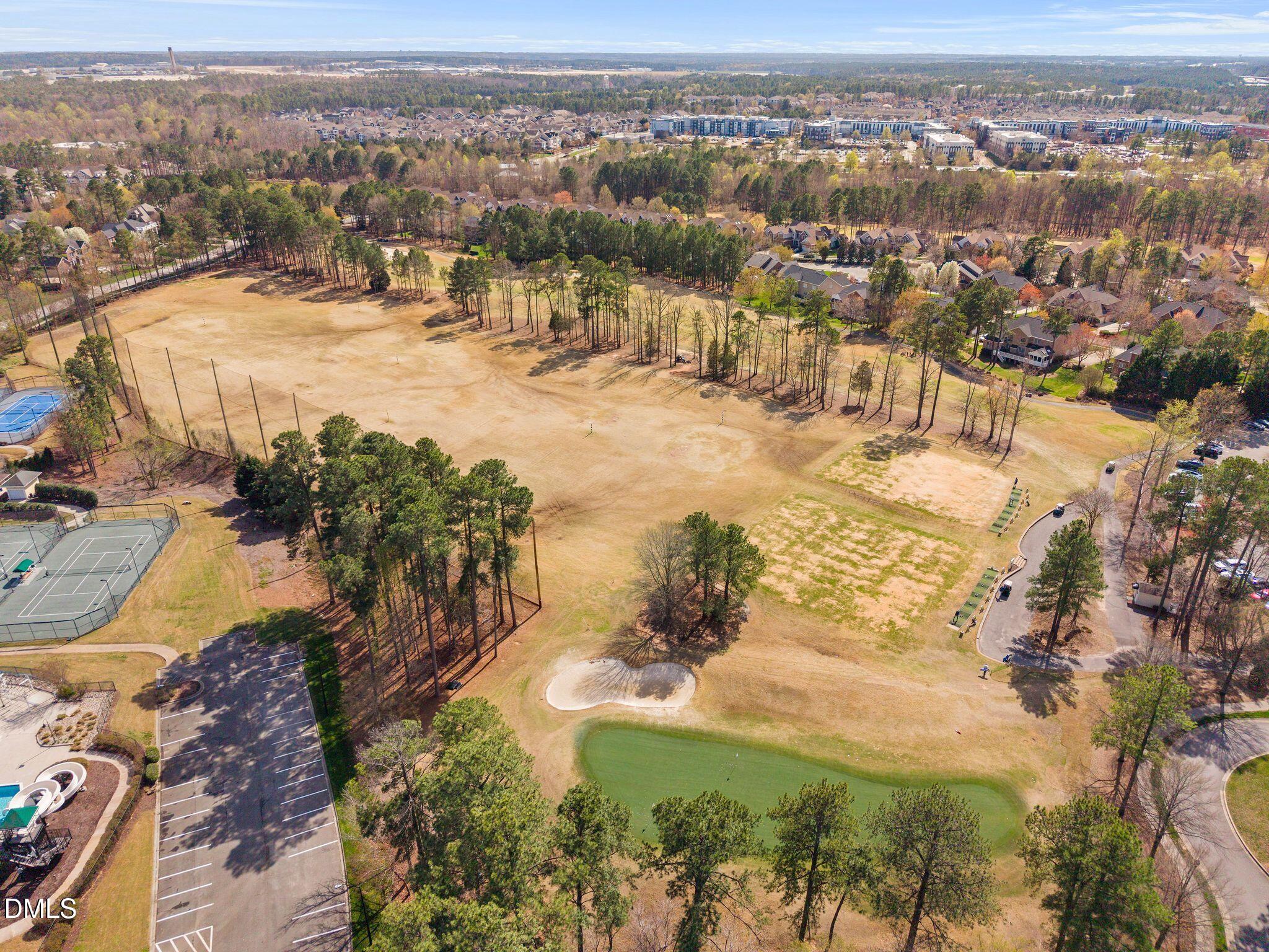 10511 Rosegate Court, Unit 305 Raleigh, NC 27617 - Photo 48 of 48 an aerial view of residential houses with outdoor space