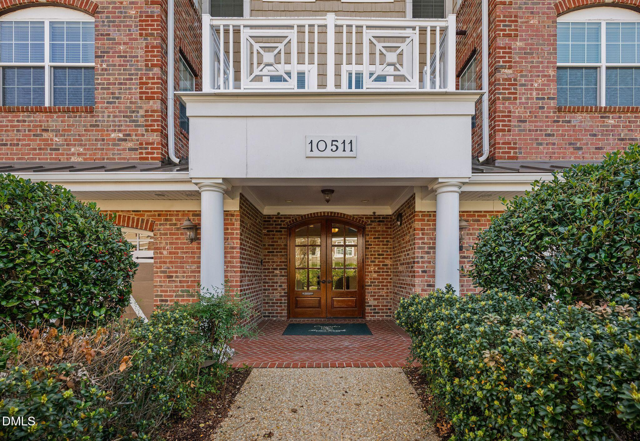 10511 Rosegate Court, Unit 305 Raleigh, NC 27617 - Photo 5 of 48 a front view of a building
