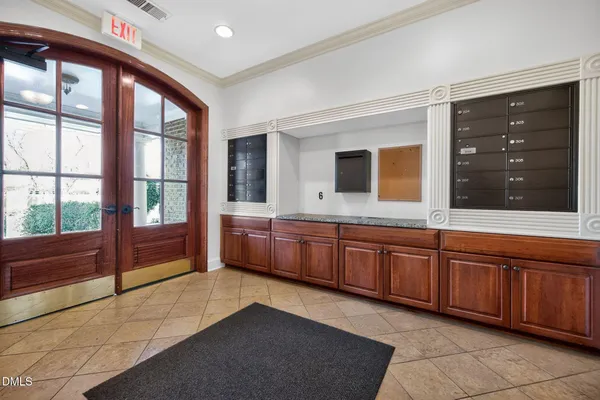 a large bathroom with a large tub and sink
