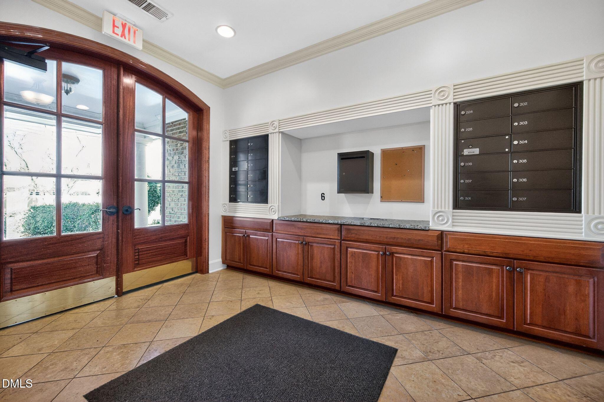 10511 Rosegate Court, Unit 305 Raleigh, NC 27617 - Photo 6 of 48 a large bathroom with a large tub and sink