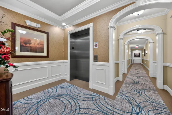 a view of a hallway view with staircase