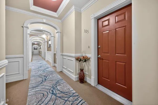 a view of a hallway with a furniture
