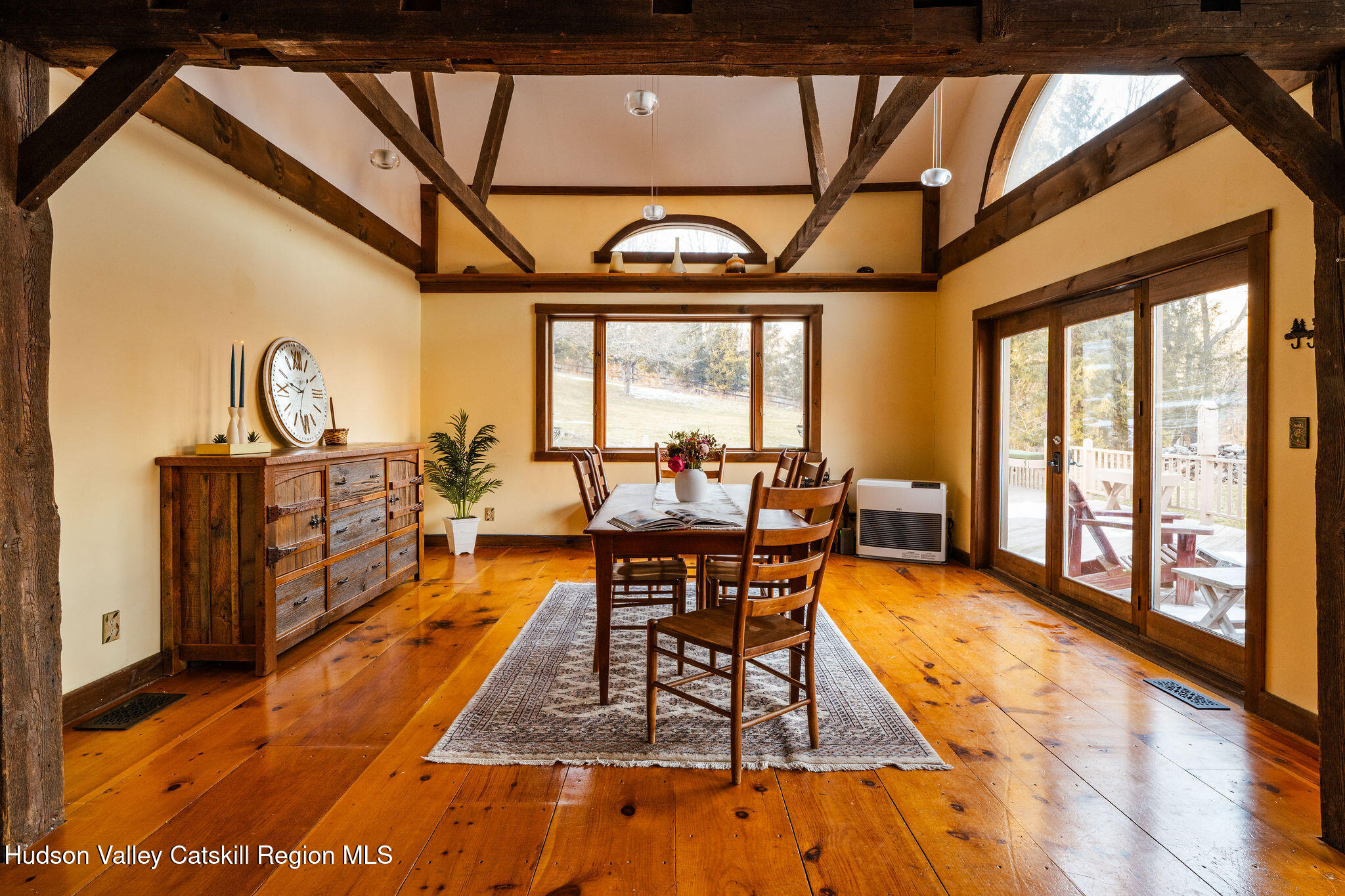 6841 County Highway Denver, NY 12421 - Photo 14 of 36 a view of a dining room with furniture a chandelier and wooden floor
