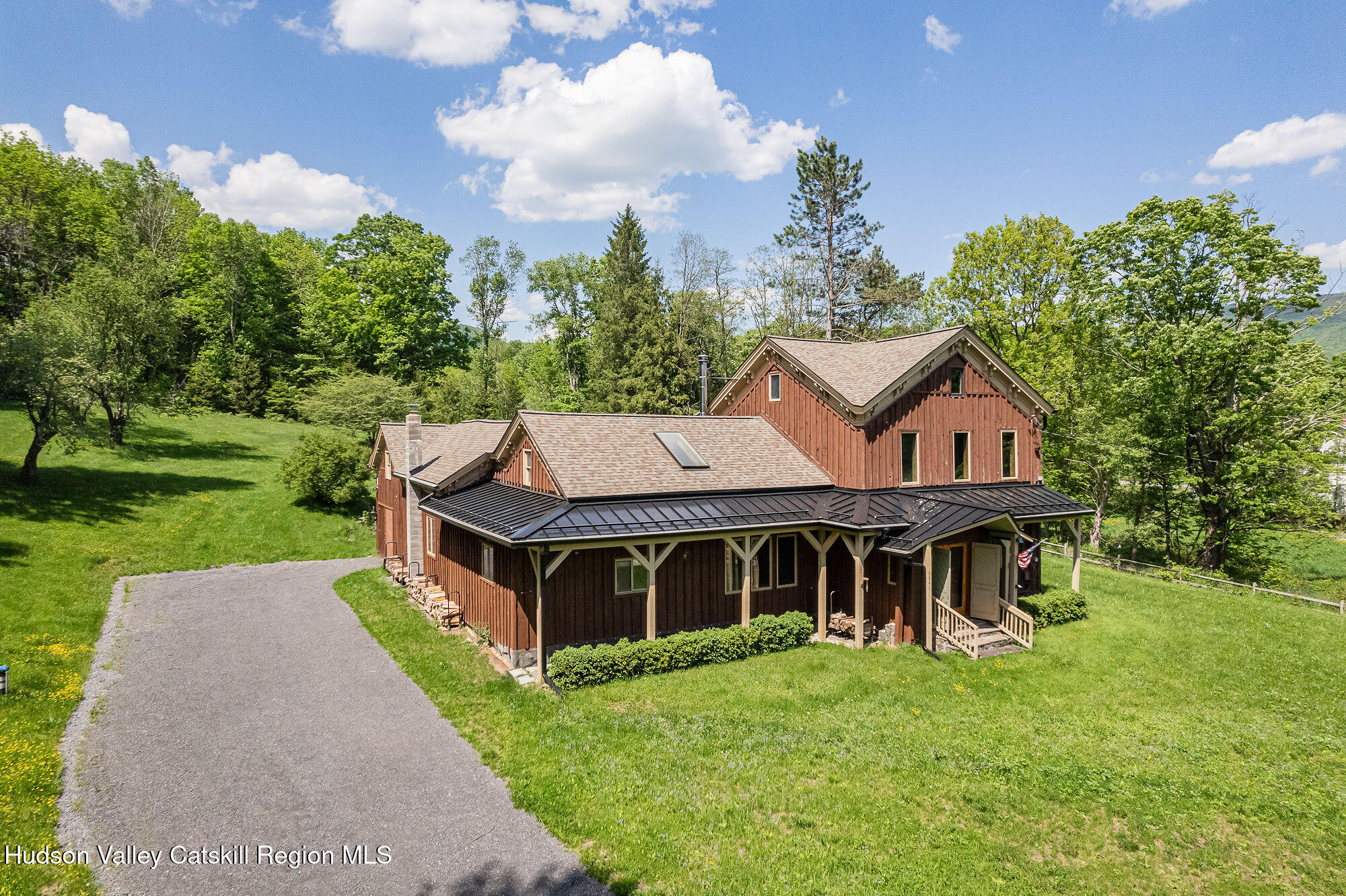 6841 County Highway Denver, NY 12421 - Photo 35 of 36 a aerial view of a house with yard and green space
