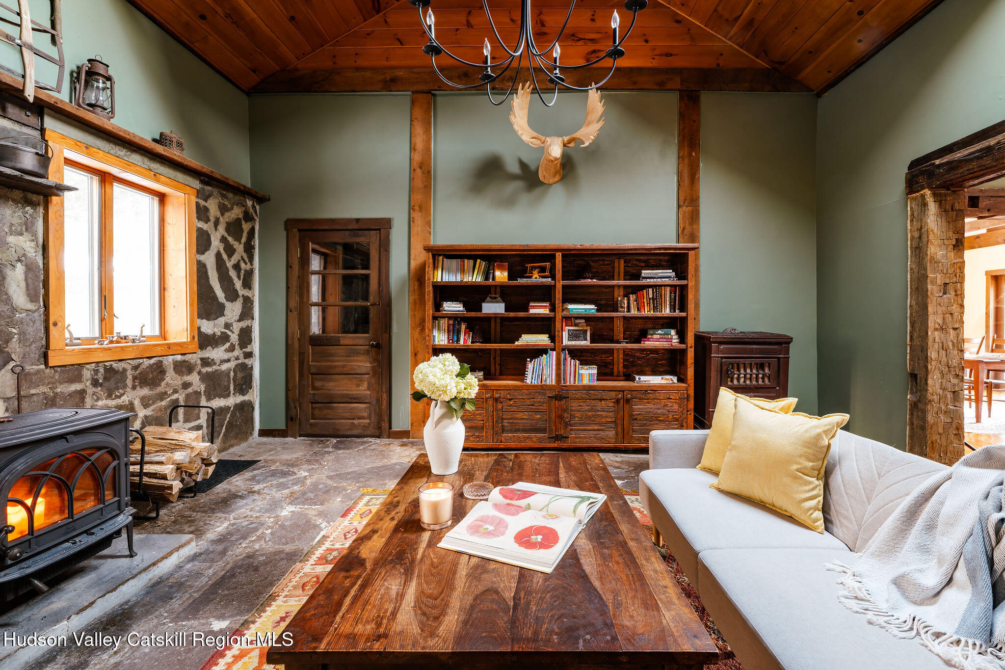 6841 County Highway Denver, NY 12421 - Photo 7 of 36 a living room with furniture and a fireplace