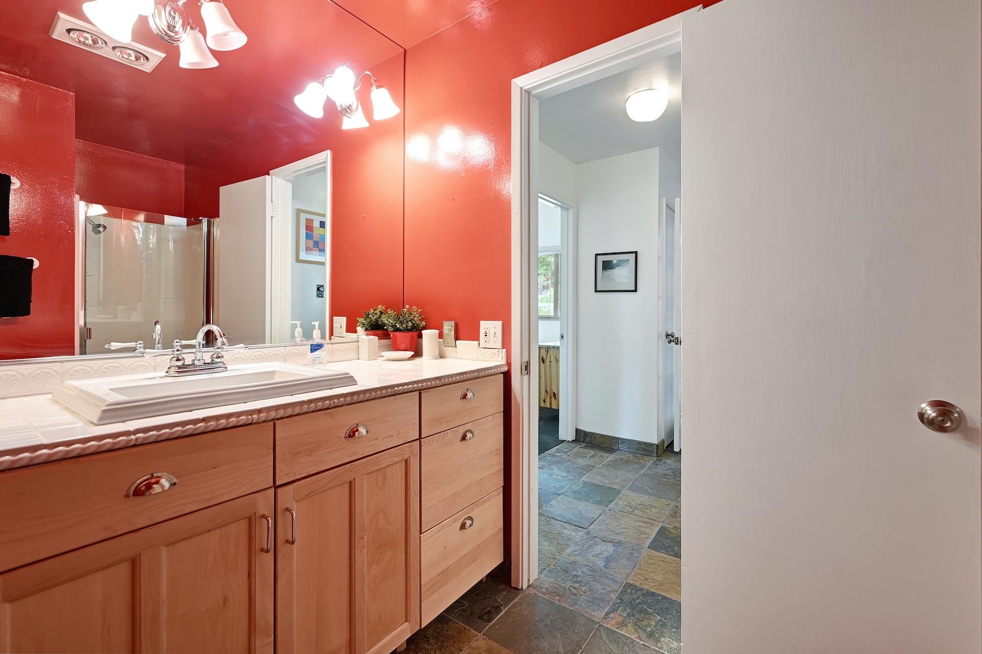 2 Snowridge Lane Mammoth Lakes, CA 93546 - Photo 16 of 25 a bathroom with a double vanity sink and a mirror