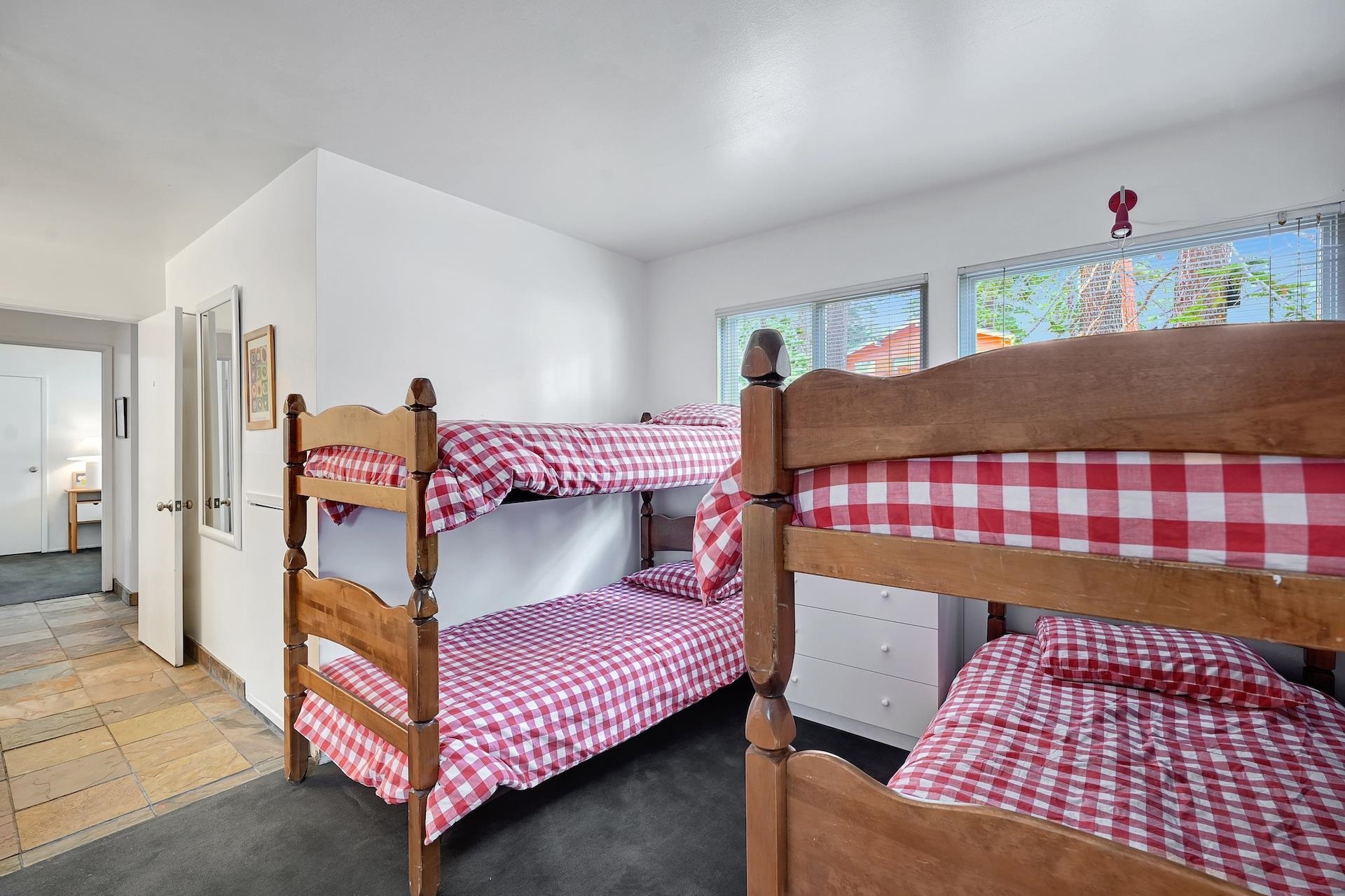 2 Snowridge Lane Mammoth Lakes, CA 93546 - Photo 19 of 25 a bedroom with a bed and window