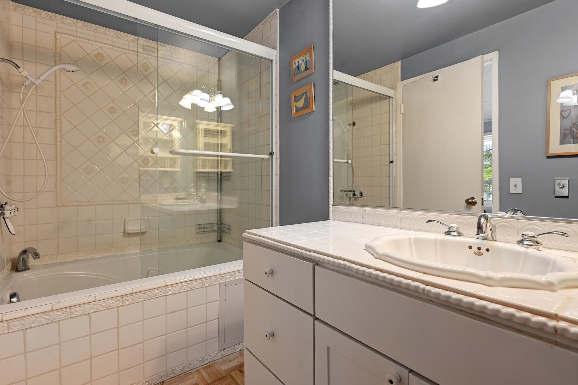 2 Snowridge Lane Mammoth Lakes, CA 93546 - Photo 23 of 25 a bathroom with a bathtub and a sink