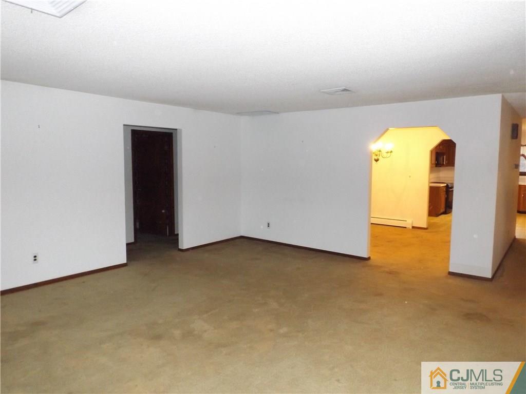 218 Docks Corner Road Dayton, NJ 08810 - Photo 2 of 21 a view of a room with painted walls