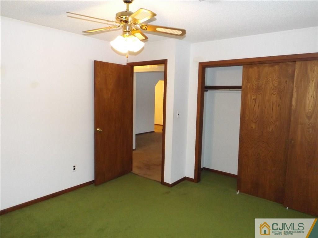218 Docks Corner Road Dayton, NJ 08810 - Photo 16 of 21 wooden floor in an empty room with a window