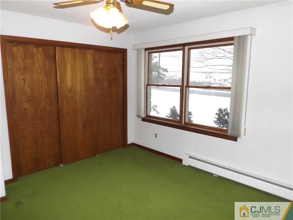 218 Docks Corner Road Dayton, NJ 08810 - Photo 18 of 21 a view of an empty room with a window