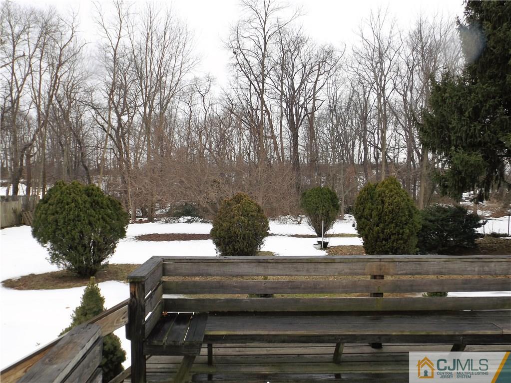 218 Docks Corner Road Dayton, NJ 08810 - Photo 19 of 21 a view of a bench in a yard