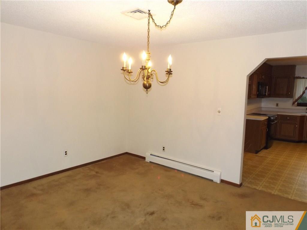 218 Docks Corner Road Dayton, NJ 08810 - Photo 5 of 21 a view of a room with a sink and cabinets