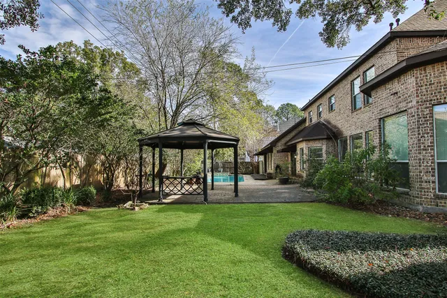a view of a yard with a slide