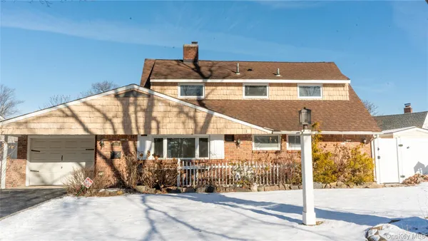 $895,000 | 2155 Salisbury Park Drive, Westbury, NY 11590