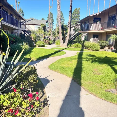 a view of a house with swimming pool