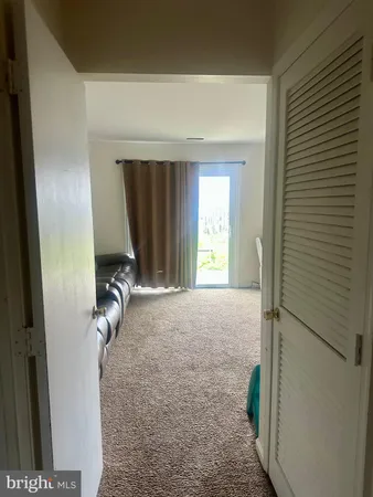 a view of a livingroom with a staircase