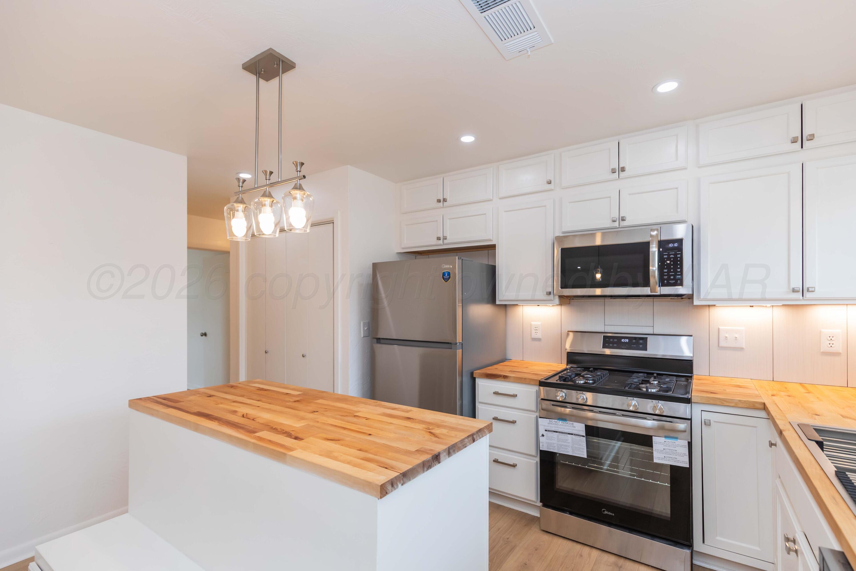 4704 South Austin Street Amarillo, TX 79110 - Photo 8 of 38 KITCHEN VIEW 4