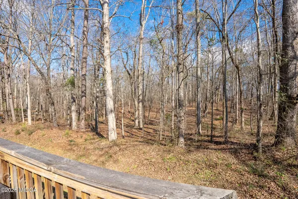 a view of a backyard of the house