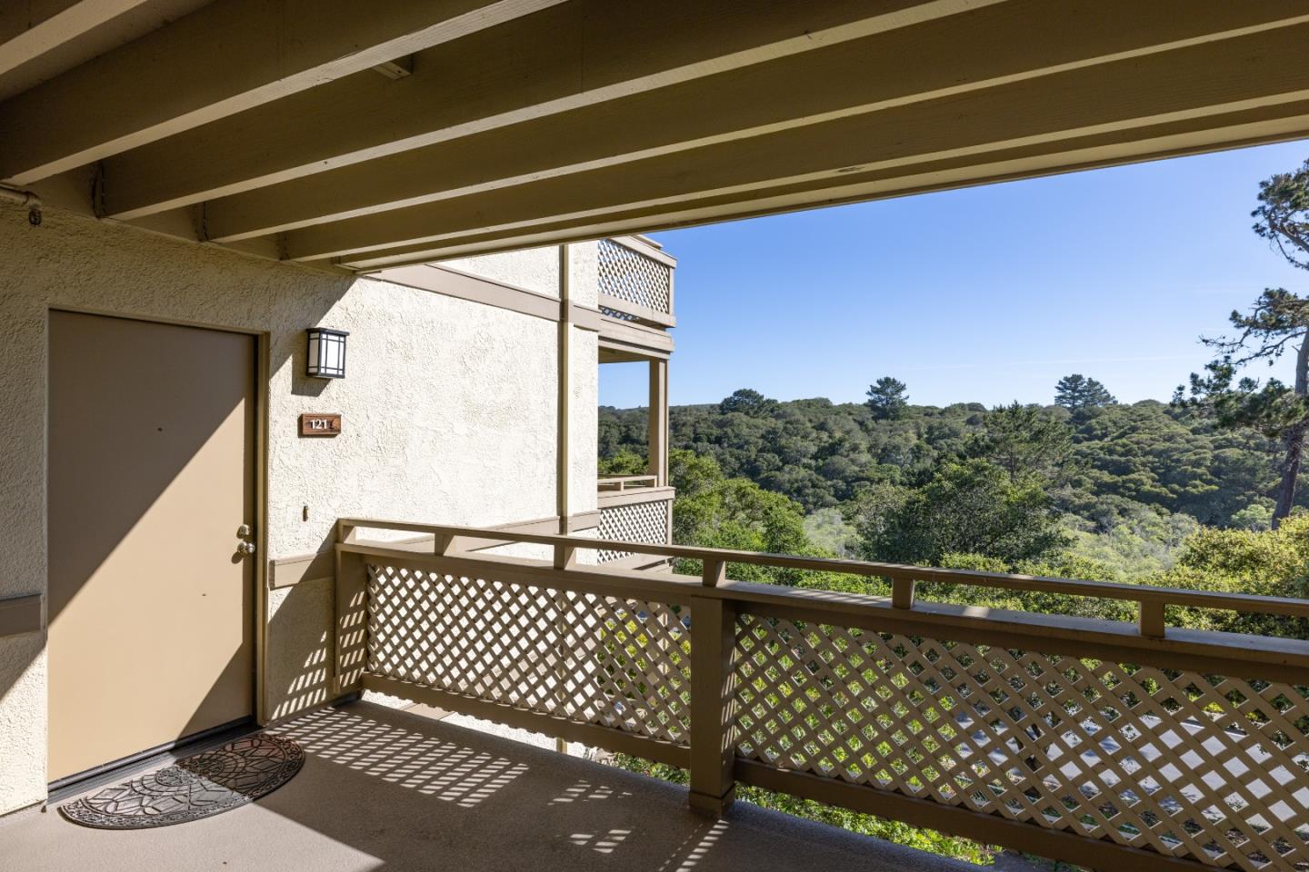 121 Quail Run Court Del Rey Oaks, CA 93940 - Photo 2 of 33 a view of a balcony with wooden floor and fence