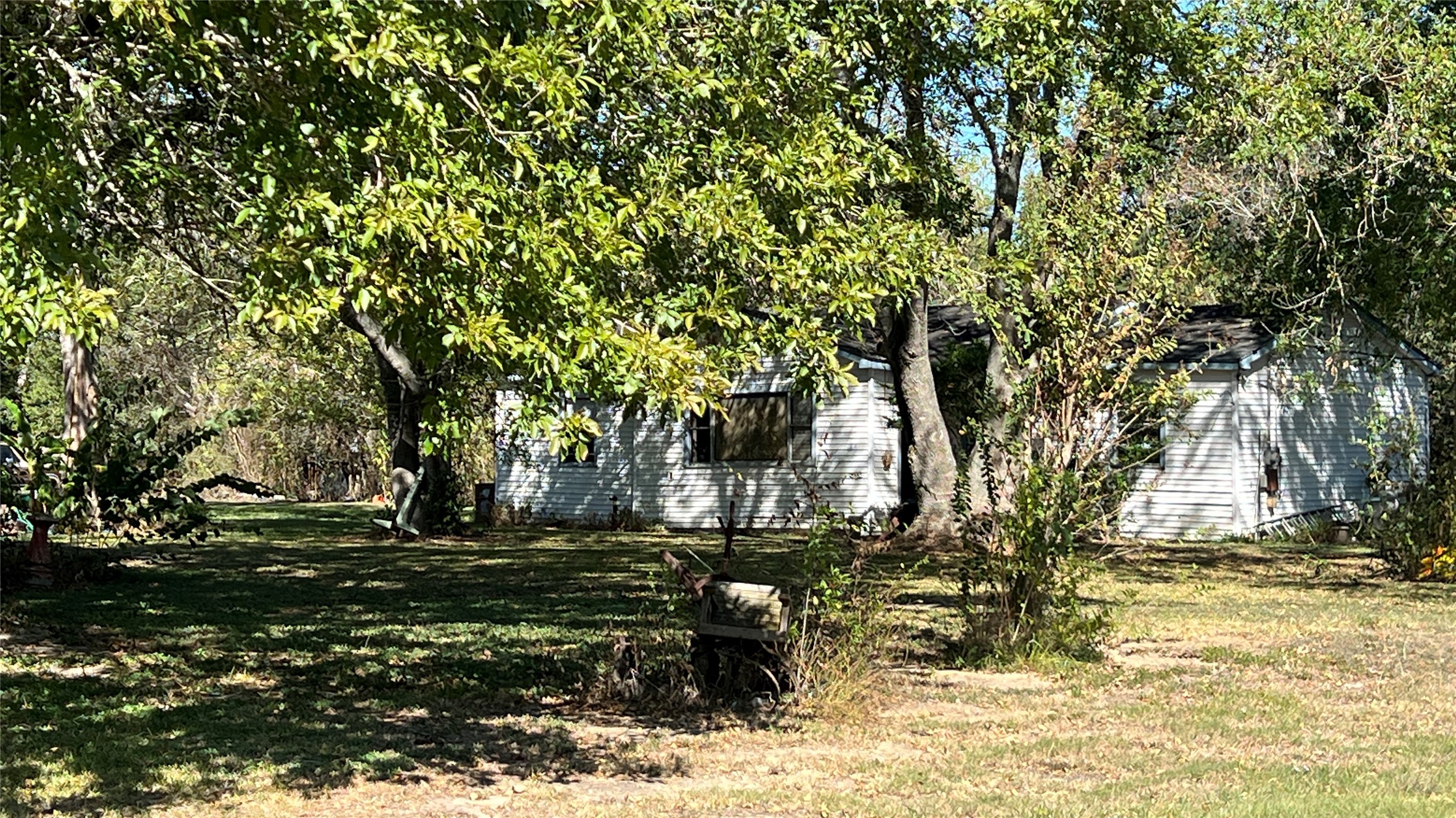 10111 Oberrender Road Fairchilds, TX 77461 - Photo 18 of 20 a backyard of a house with lots of green space