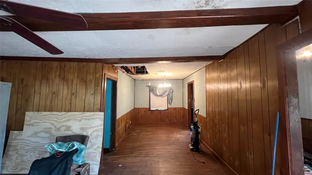 a view of hallway with livingroom