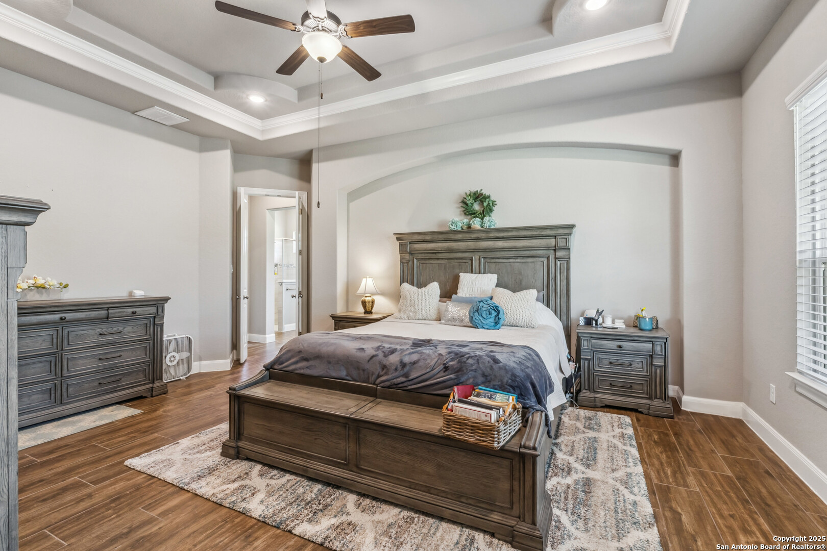 2319 Cascada Parkway Spring Branch, TX 78070 - Photo 16 of 32 a bedroom with a bed and wooden floor