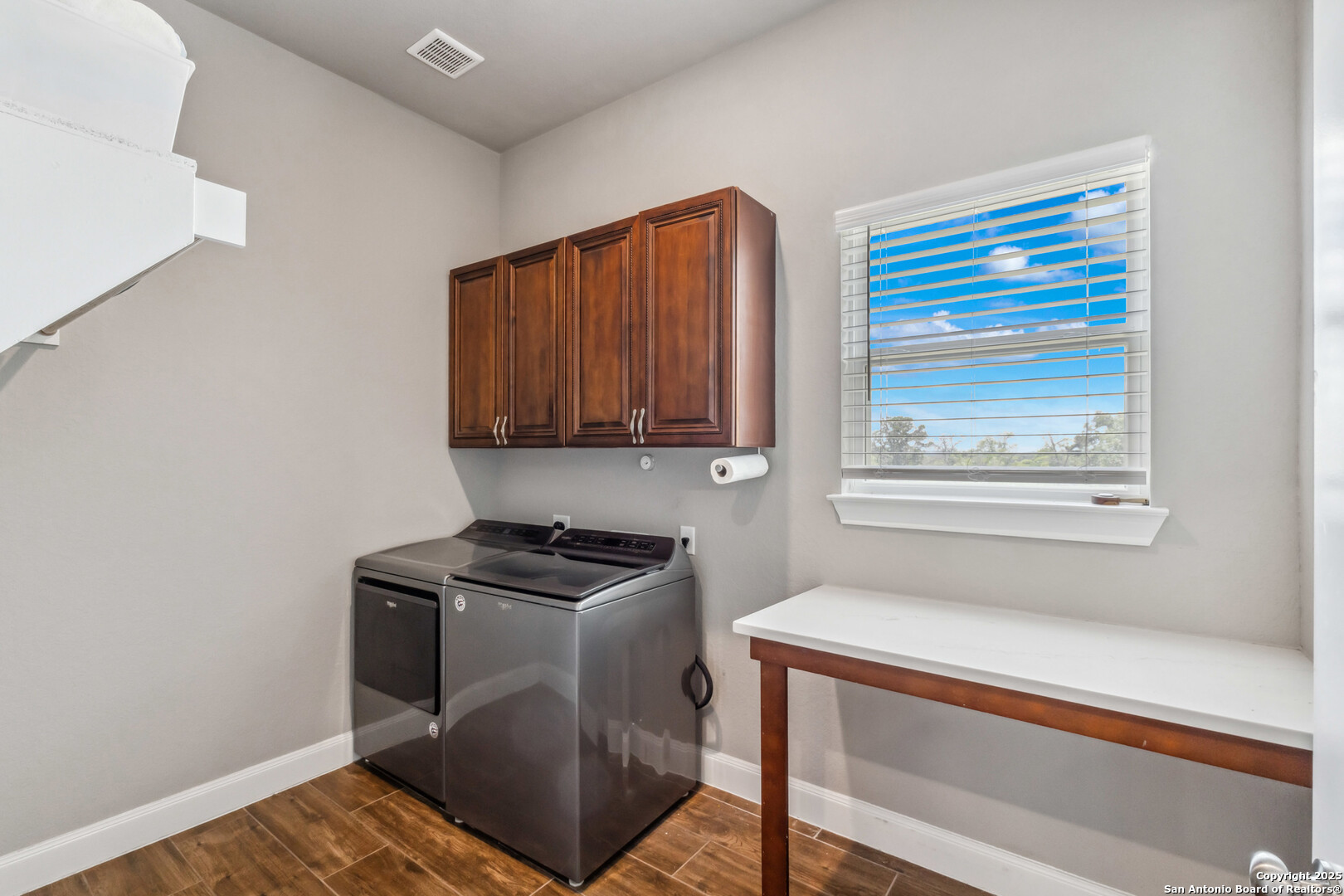 2319 Cascada Parkway Spring Branch, TX 78070 - Photo 22 of 32 a utility room with dryer and washer